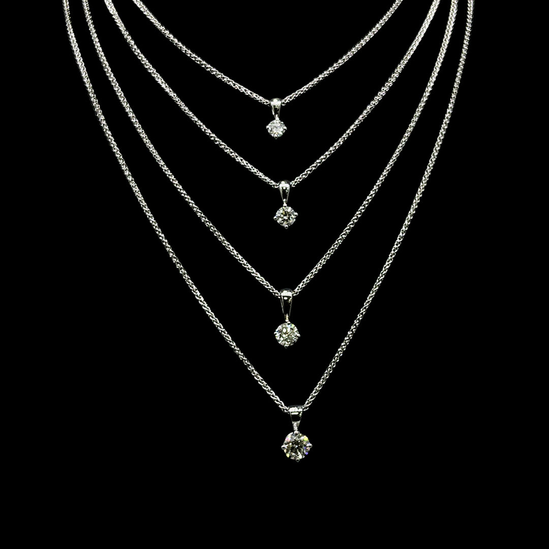 Diamond pendants | Claw set | Round brilliant | 18ct White Gold