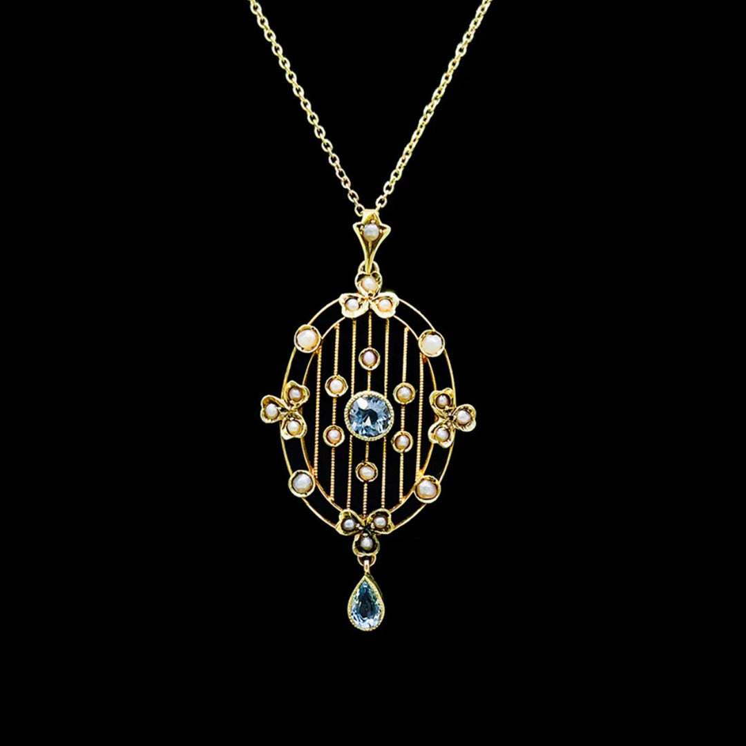 Aquamarine and seed pearl pendant | 15ct Yellow Gold